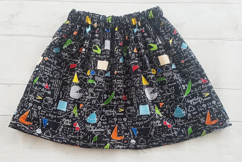 A black children's skirt with STEM print