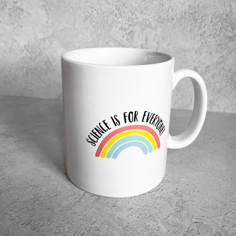 A white mug with a rainbow and the words 'science is for everyone'