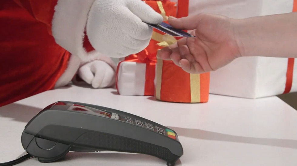 Customer paying with a credit card.
