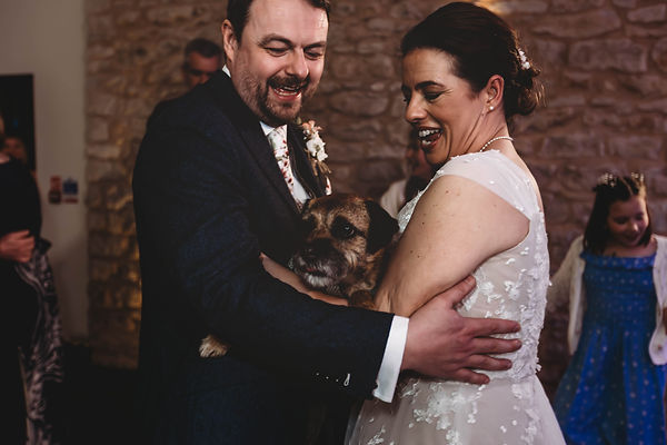 Candid first dance with dog at a relaxed South East wedding