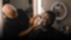 African American Barber doing beard