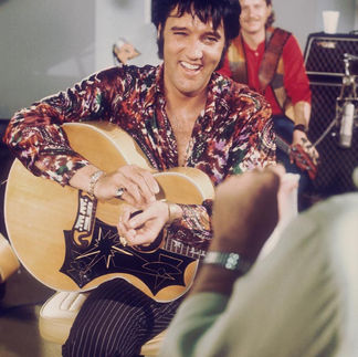 Elvis with guitar