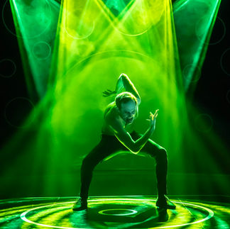 A man contorts his body on stage