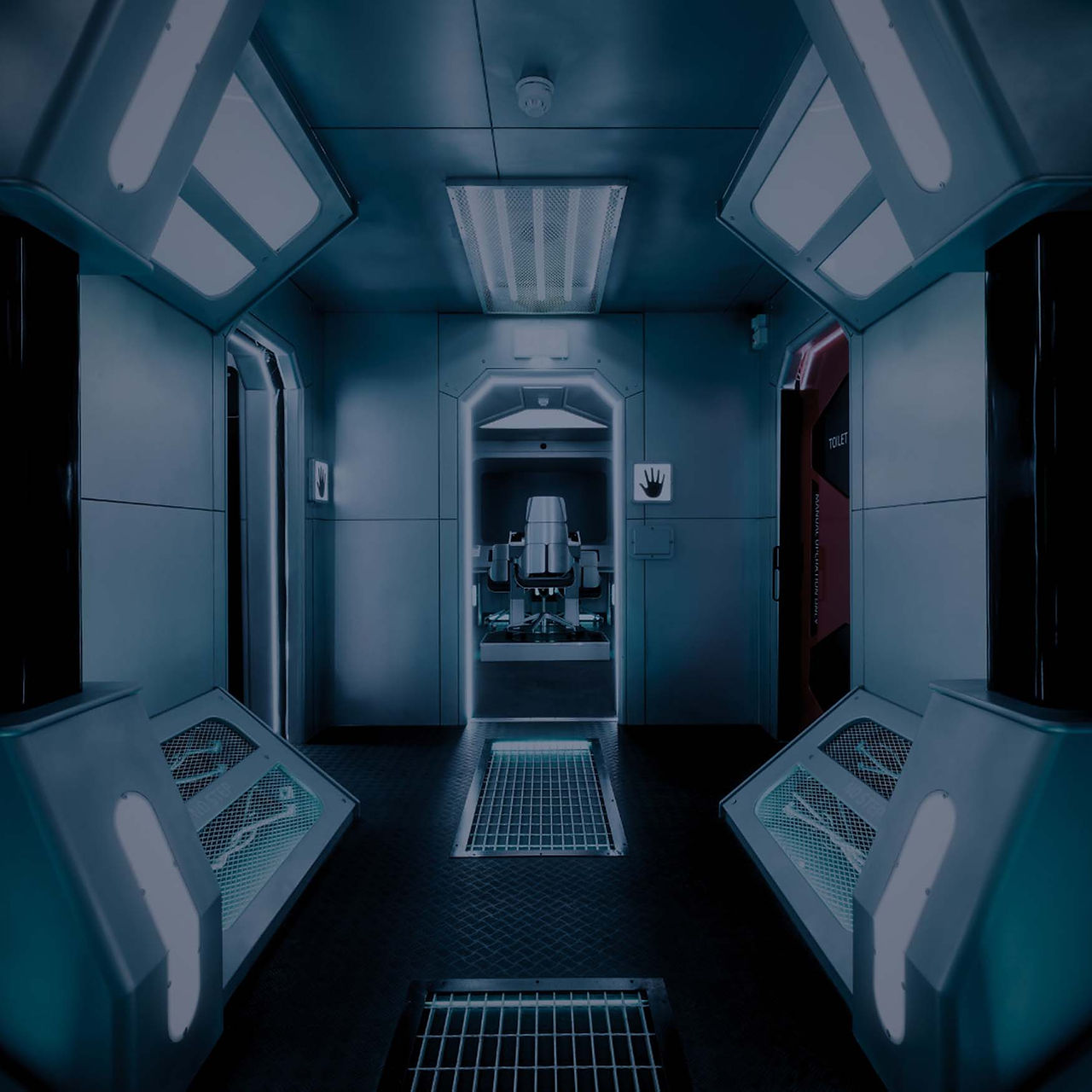 Futuristic hallway with bright blue lighting, featuring a central chair in the background and a "Toilet" sign on the right door. Moody and sterile.