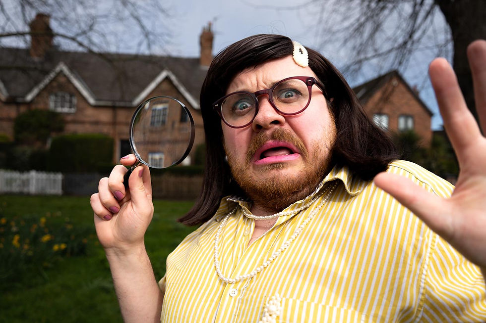 Startled person in yellow striped shirt holds a magnifying glass in a suburban yard, with houses blurred behind.