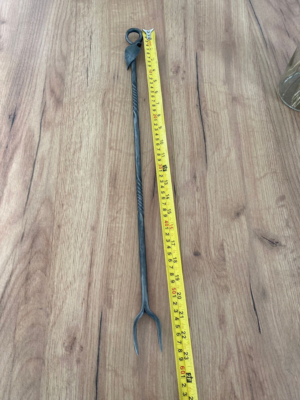 Thumbnail: Hand forged toasting fork with leaf detail and twist.