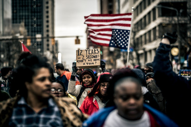 "Cardboard Justice" -- December 29, 2105. Protesters took to the streets of Cleveland, Ohio after the local grand jury decided not to indict the officers who shot and killed 12-year old Tamir Rice in less than 2 seconds of arriving on the scene. Rice was holding a toy gun. Officer Timothy Loehmann and Officer Frank Garmback remain on the Cleveland Police force.