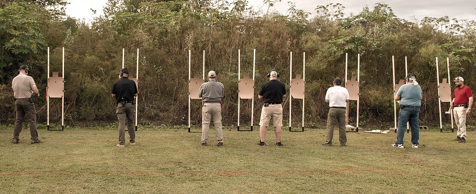 Armed church safety team volunteers training at outdoor firearms range in Orlando Florida