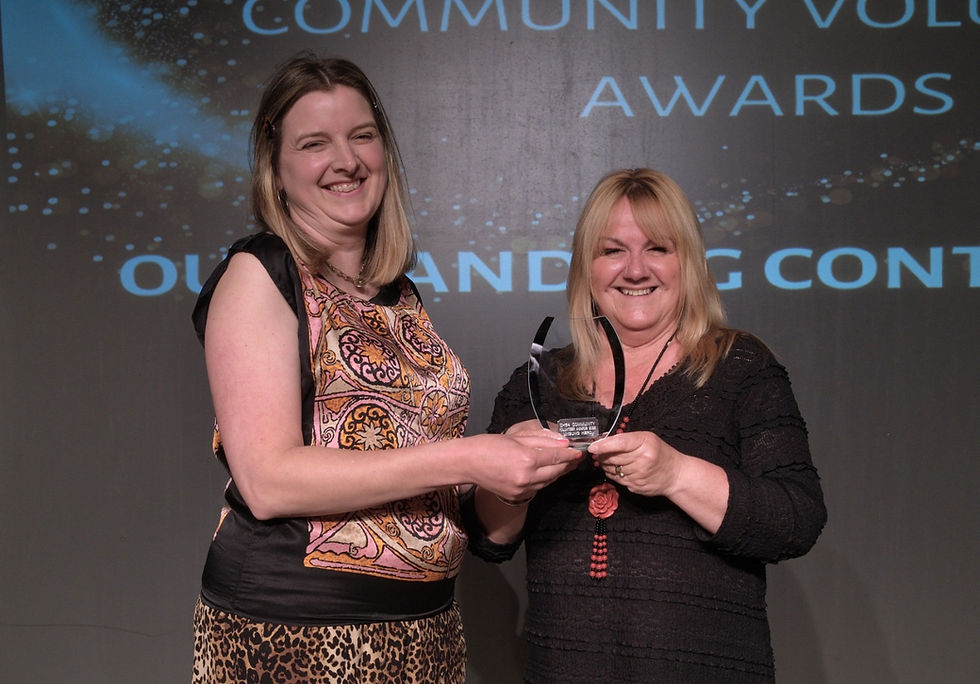 Unsung Hero Award winner, Chris Lett and Becky Whitmore from Cheshire Community Action who presented the award. Photo by Bernard Rose.