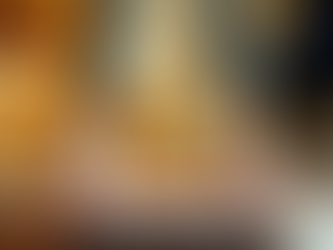 Closeup on young woman in fitness clothes in the modern house training using vibration power plate