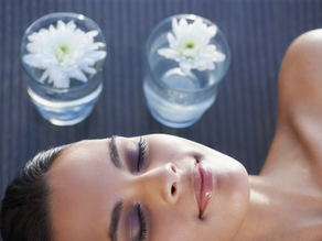 A refreshed beauty relaxing at the spa