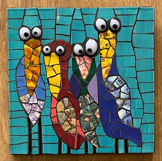 Mosaic artwork: four birds with googly eyes