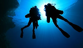 Silhouette of Scuba Divers
