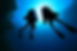 Silhouette of Scuba Divers