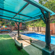 swimming-pool-near-lounge.jpeg