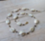 White baroque pearl chain with garnet & hematite accents on gold toned wire