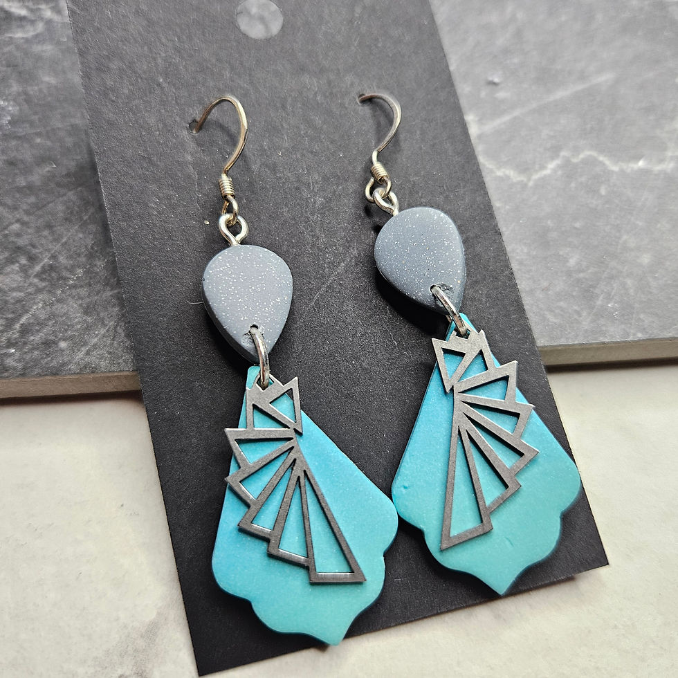 Silver sparkly drops to green blue ombre with steel half fan