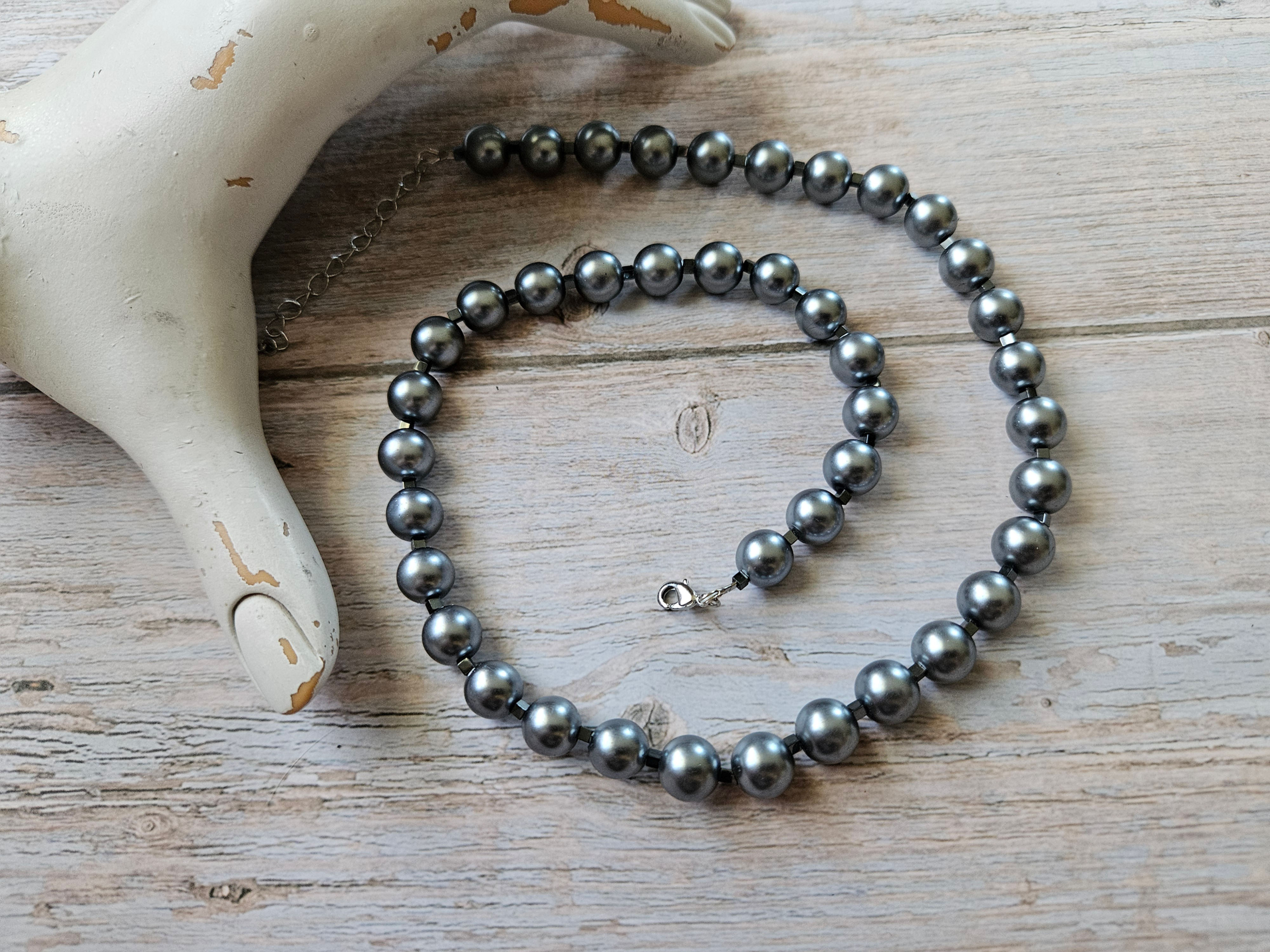 Silver pearl necklace with black hematite cube accent beads