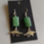 Stegosaurus earrings with green aventurine beads