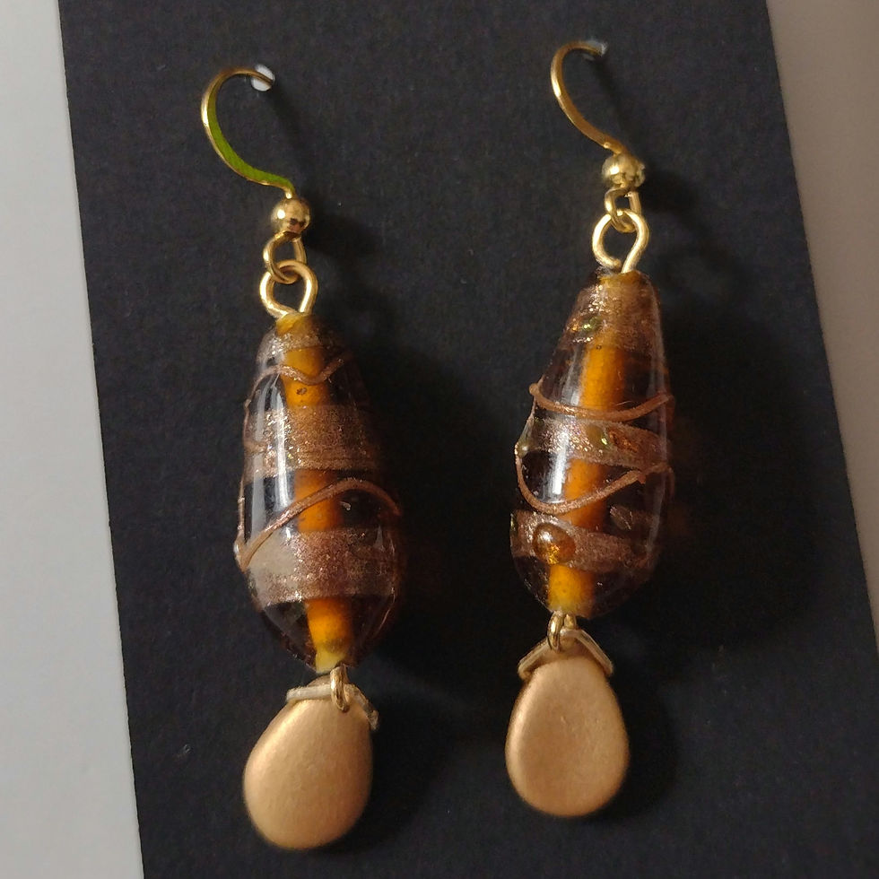 Thumbnail: Earrings with honey-toned lampwork beads and drops.