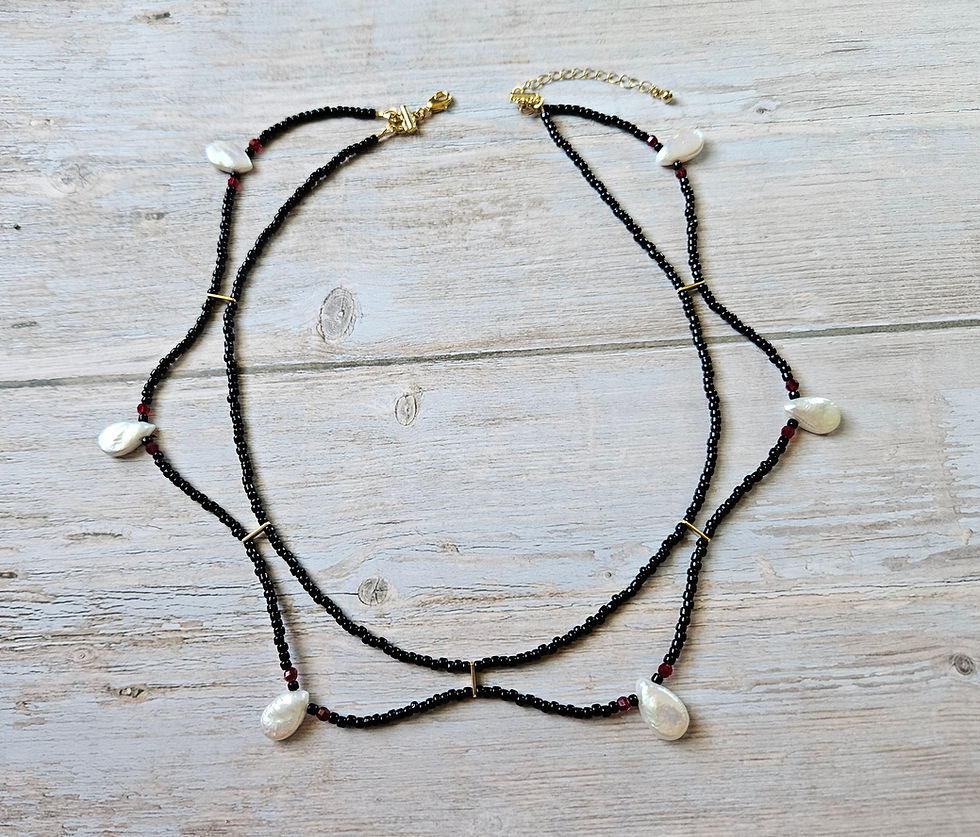 Thumbnail: Draped dual strand black bead & teardrop pearl necklace with red crystal accents