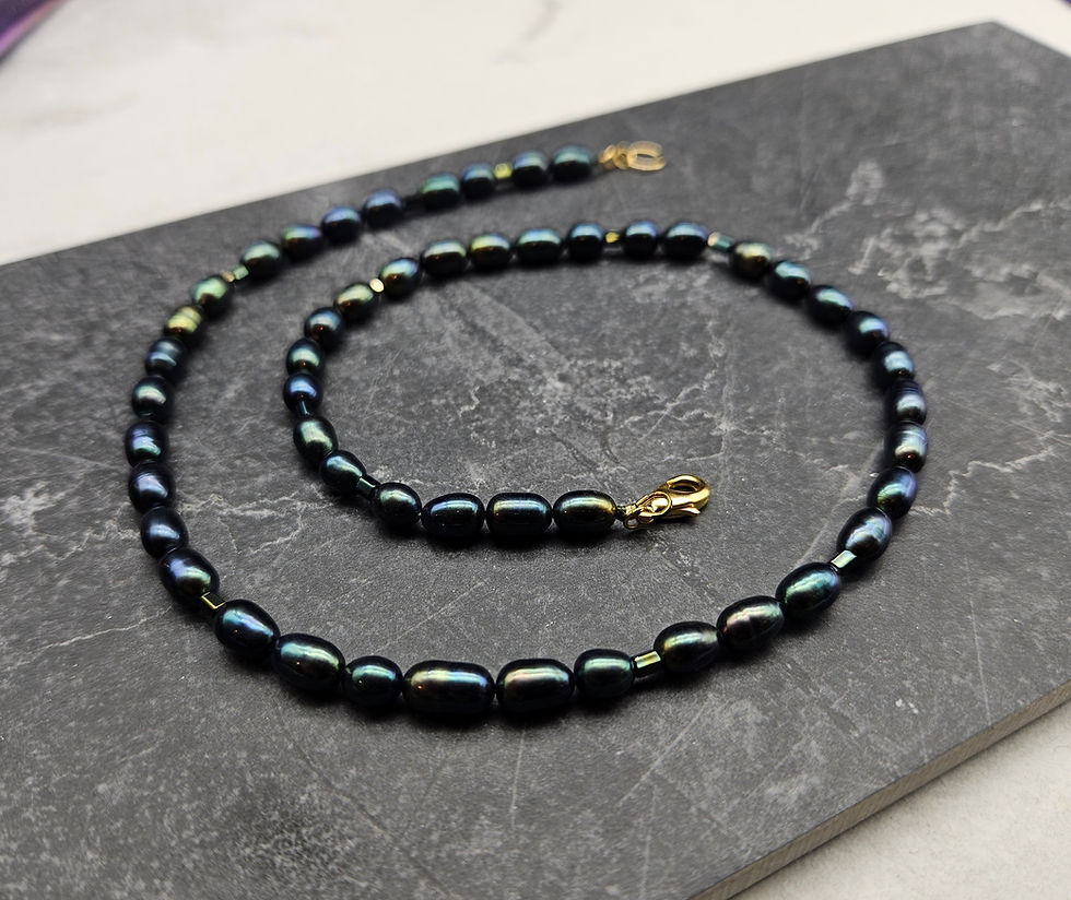 Strand of dark green pearls