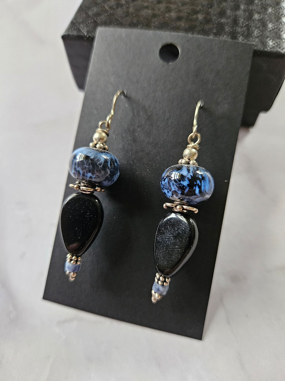 Thumbnail: Earrings with blue lampwork beads and onyx teardrops