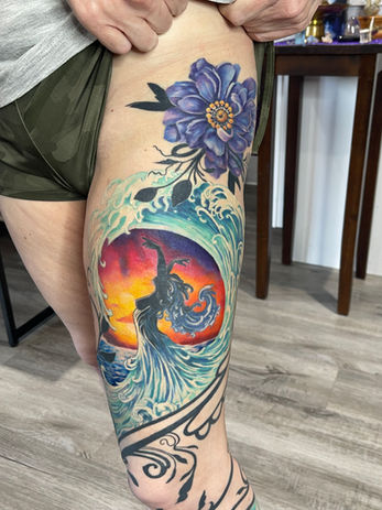 bright color; water goddess; sunset tattoo; woman made of water; leg sleeve; water leg sleeve; drawn on; custom tattoo; leg composition; Lita Edwards; dunedin; dunedin tattoo shop; tattoo shop near me; scar coverup tattoo shop; chest tattoo artist; best color artist; award winning; breast cancer artist; moffitt cancer center;