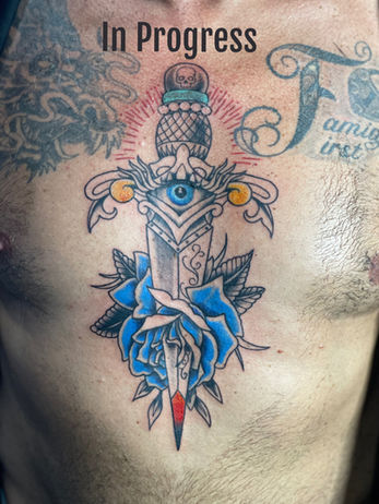 dagger tattoo, dagger, rose, rose tattoo, dagger and rose tattoo, lita edwards, chest tattoo, tattoo ideas, traditional, american traditional, traditional artist, mastectomy artist near me