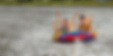 Kids tubing on the river
