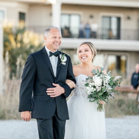 Father walks daughter down the aisle