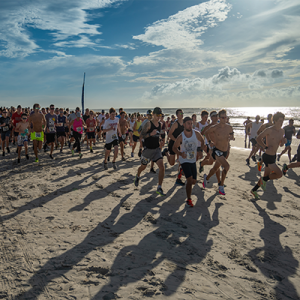 runners on the beach at the Palmetto Dunes Turtle Trot