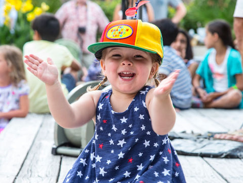 Little girl clapping at HarbourFest