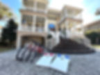 HHO bikes and corn hole in front of vacation rental