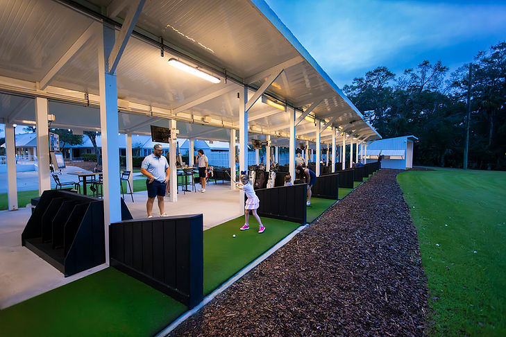 Toptracer range with families playing and enjoying