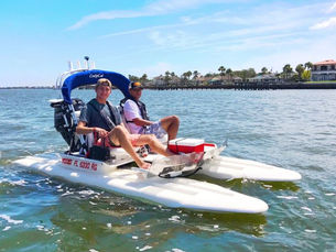 Craigcat boat in water with 2 people