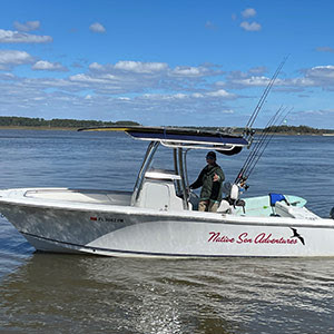 native sons fishing boat out on the water