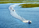 Craigcat Catamaran Boat in the water going fast