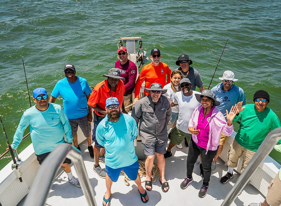 Group of people on party fishing boat in water