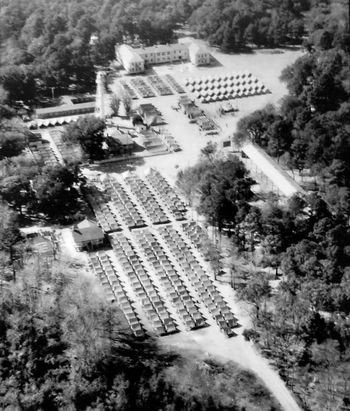 old aerial photo of lighthouse and marine barracks