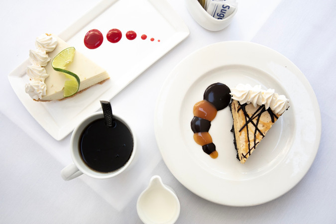 two signature desserts and a cup of coffee including key lime pie and peanut butter pie