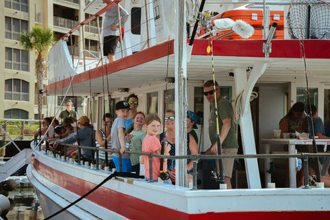 Group of people enjoying Captain Hook Boat