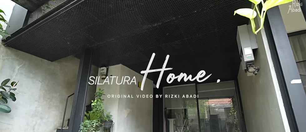Modern home entrance with plants and black perforated ceiling. Text: SILATURA Home. Original video by Rizki Abadi. Mood: welcoming.