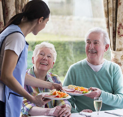 Elderly-couple-getting-served-healthy-food.jpg