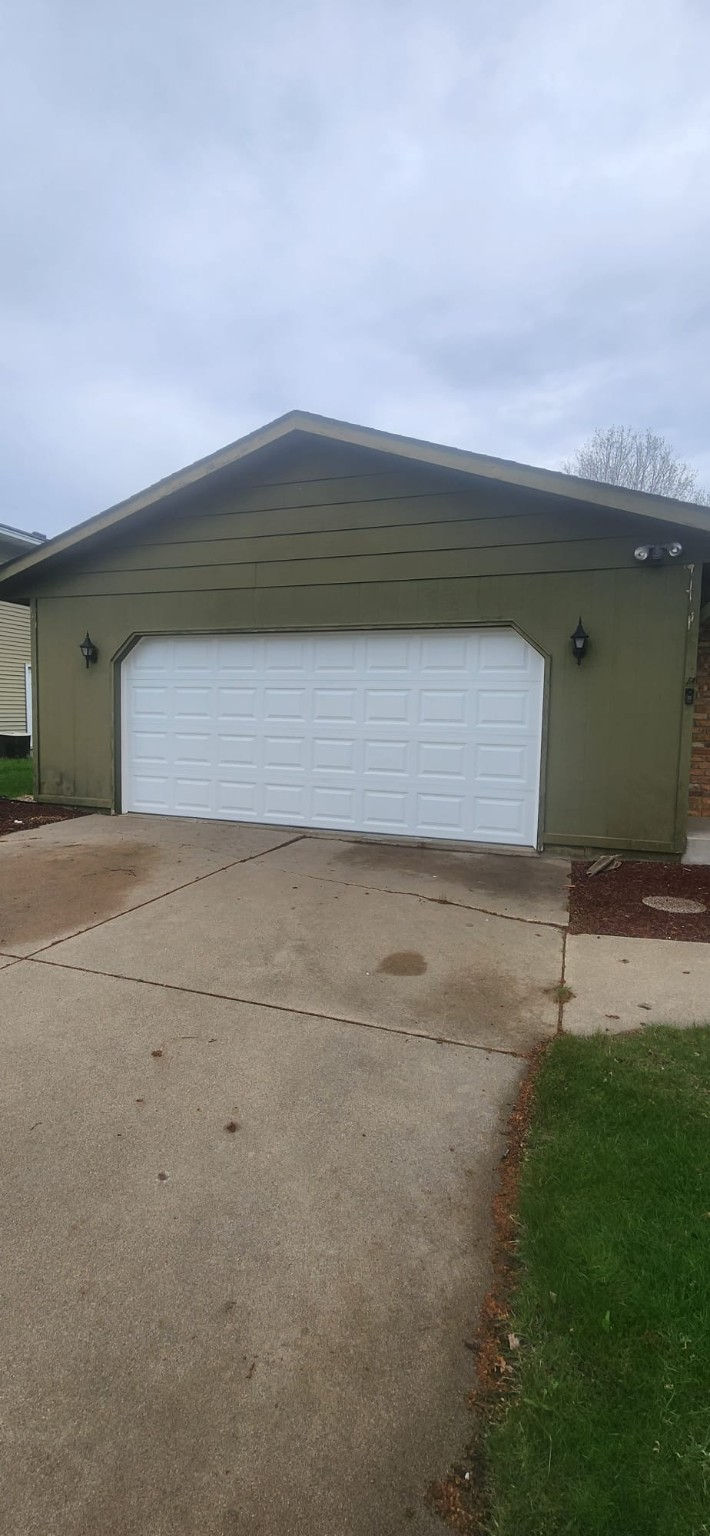 New white garage door installation