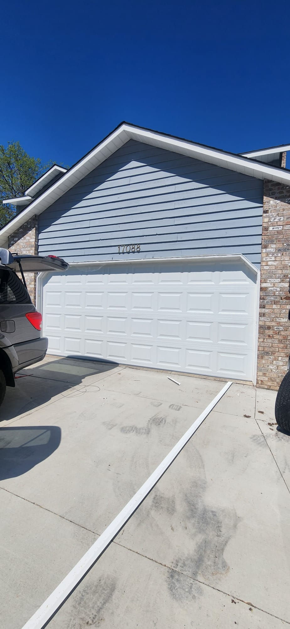 AFTER — New white garage door