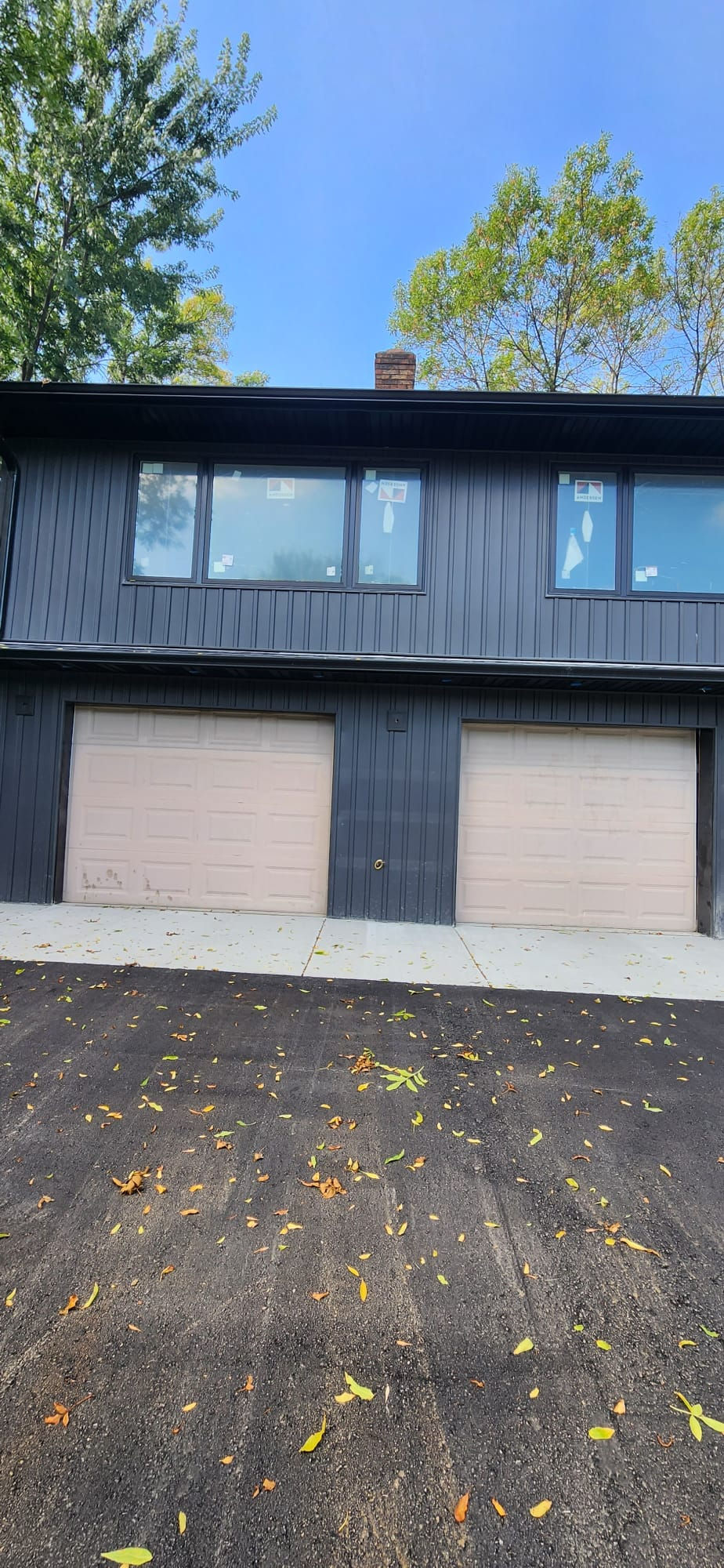 BEFORE — Original light garage doors