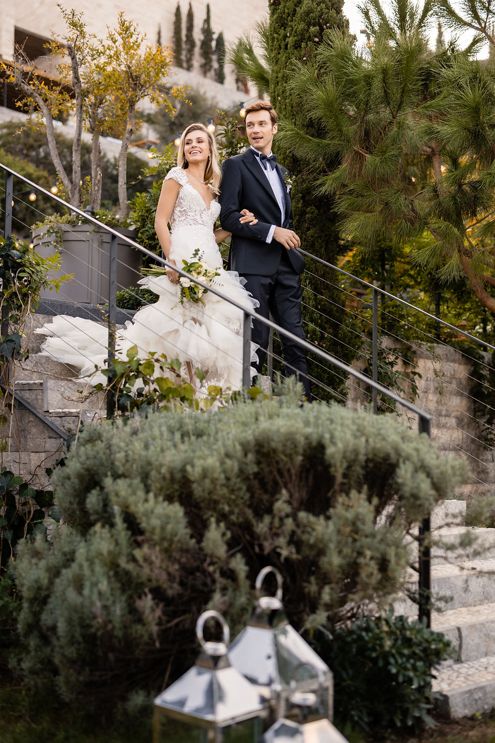 bride and groom walking down the stairs on bodrum edition hotel