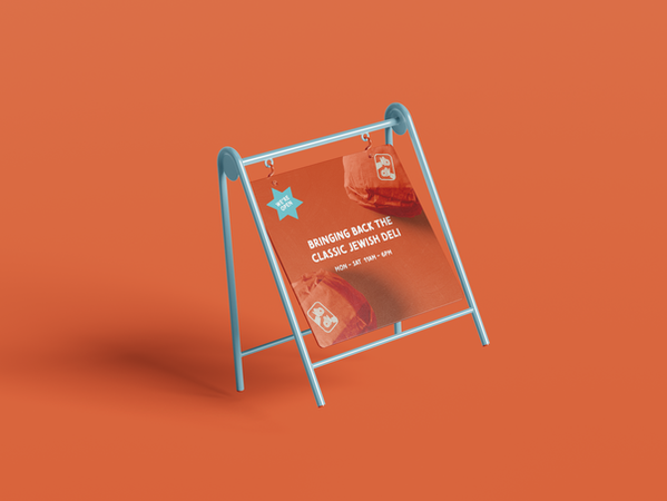 An a-frame sign with a promotional message about the restaurant