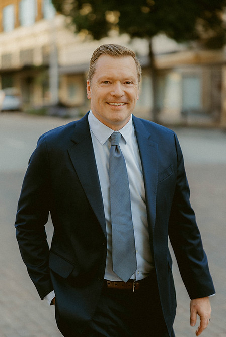 Eric Moyer smiles as he walks in downtown, Lincoln, Nebraska.